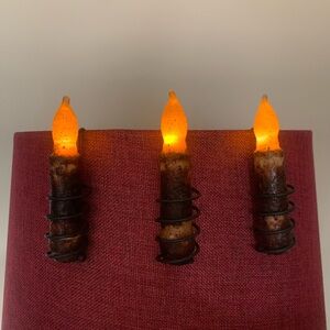 Rustic Candles with Orange Glow and metal hangers